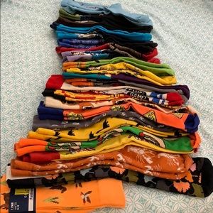 Lot of 23 pairs of crazy socks.
